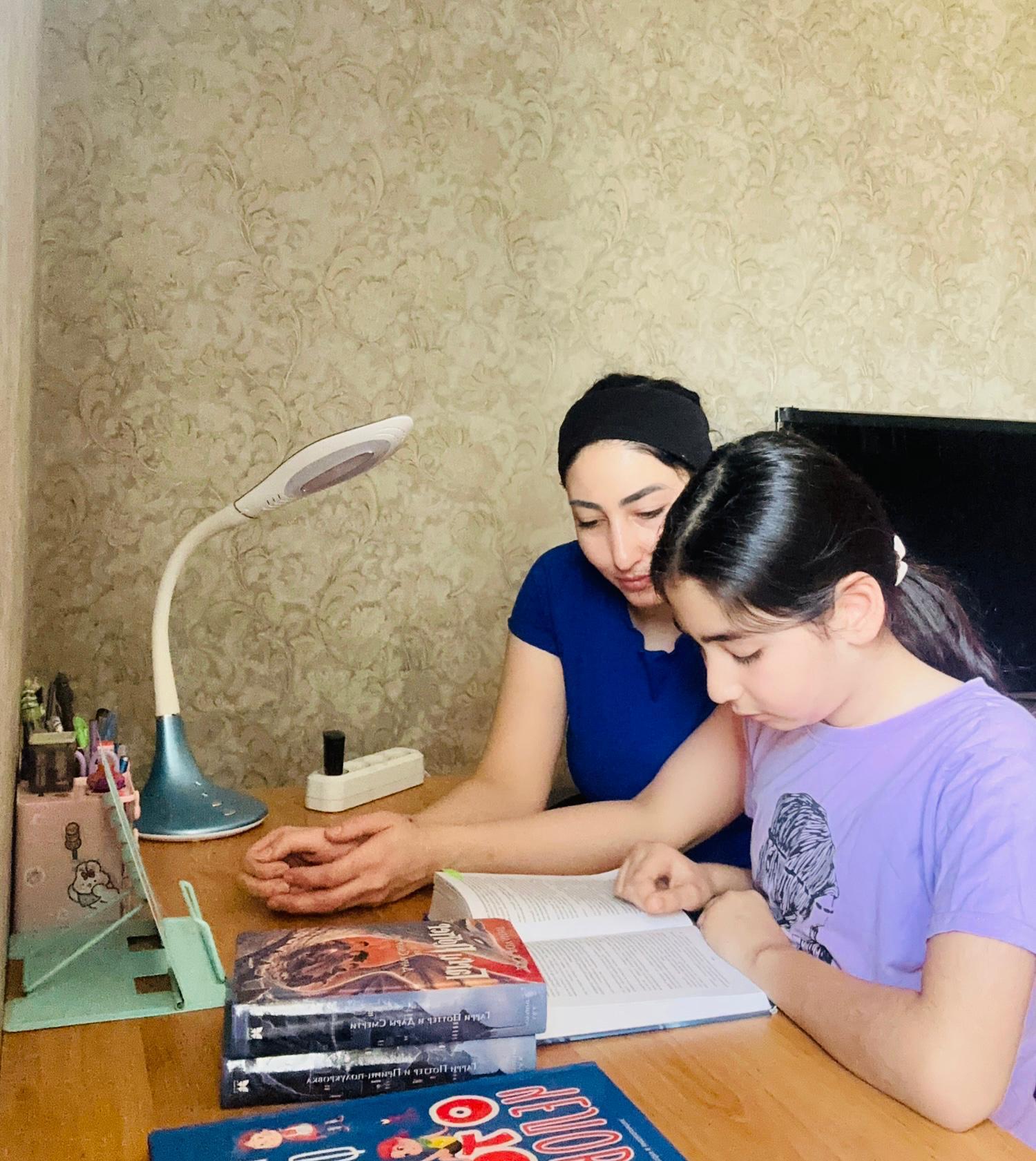 "Читающая школа" прошел семейный вечер "Читаем книги на каникулах"!